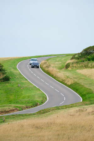 Driving a car on the S-curved roadの写真素材
