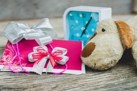 Wedding Invitation card crafting of cardboard lying on a wooden の写真素材