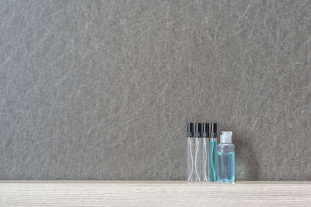 cleaning product such as hand sanitizer alcohol gel,portable alcohol spray on black background,...