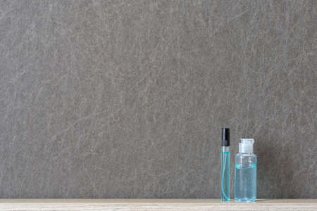 cleaning product such as hand sanitizer alcohol gel,portable alcohol spray on black background, prevent spreading of germs during infections of COVID-19,coronavirus-2019nCoV,Covid-19 concept. Copy spaの写真素材