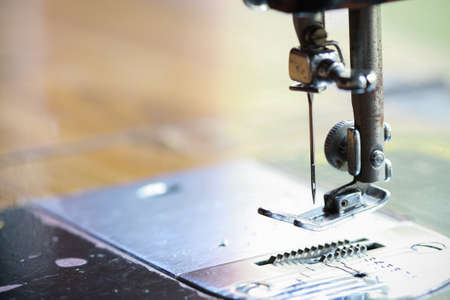the sewing machine and item of clothing, Detail of sewing machine and sewing accessories, old sewing...