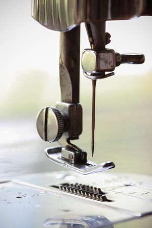 the sewing machine and item of clothing, Detail of sewing machine and sewing accessories, old sewing...