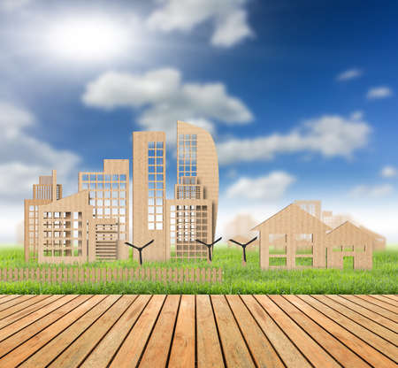 City cardboard on fresh spring green grassの写真素材