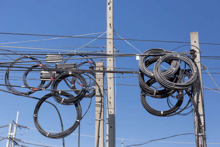 electrical wires on polesの写真素材