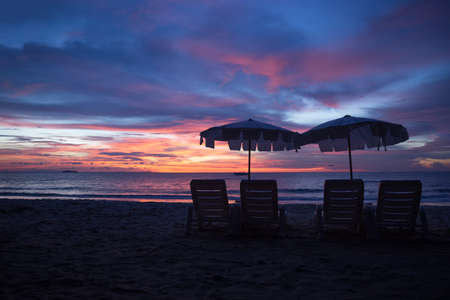 Tropical beach at sunsetの写真素材