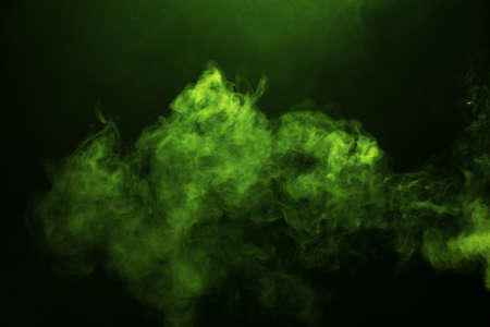 Green smoke on black background.の写真素材