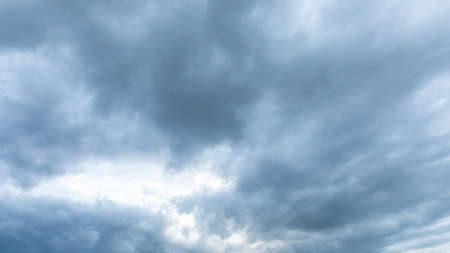 A dark cloud on the stormy sky