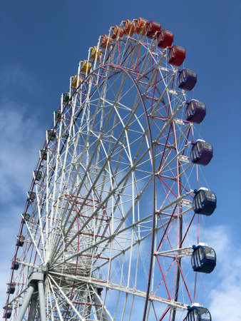 Nice street with a view of the Ferris wheel in the picture.の写真素材