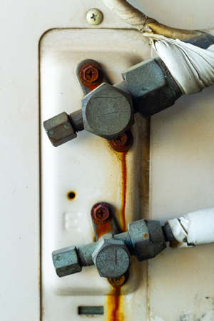 Old air conditioner and compressor rusted up.