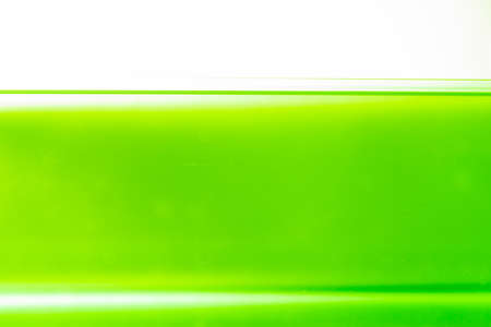 Water wave with bubble of air, on white background. Green waterの写真素材