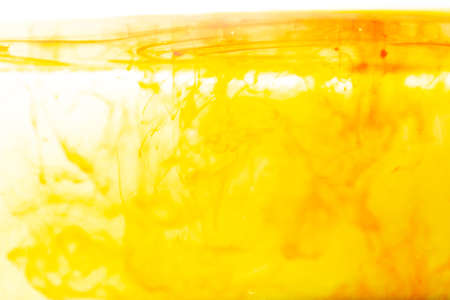 Water wave with bubble of air, on white background. Yellow waterの写真素材