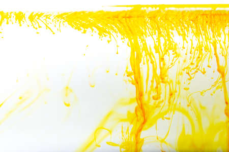 Water wave with bubble of air, on white background. Yellow waterの写真素材