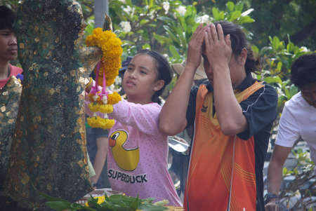Nakhon Pathom, Thailand - Feb 14, 2014 : Unidentified people visit Phra Pathom Chedi Temple for making merit on Makha Bucha Day. Phra Pathom Chedi is the largest pagoda in South-east asia.のeditorial素材