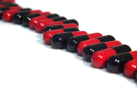 Red and black capsules lineの写真素材