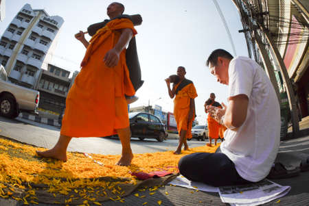 Saraburi, Thailand - May 8, 2014 : 1,000 Monks from Wat Phra Dhammakaya make a pilgrimage through central Saraburi province near Bangkok on May 8, 2014のeditorial素材