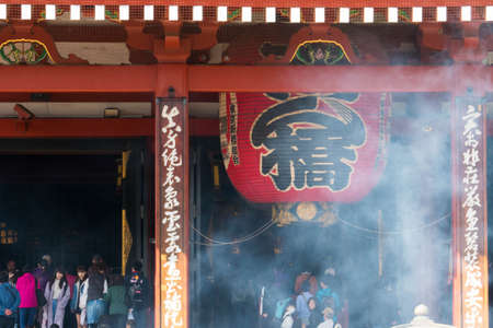 Tokyo, Japan - Mar 22, 2016 - unidentified people visit sensoji temple and burn incenses full of smoke. Sensoji temple is the most famous attraction in Asakusa, Tokyo, Japanのeditorial素材