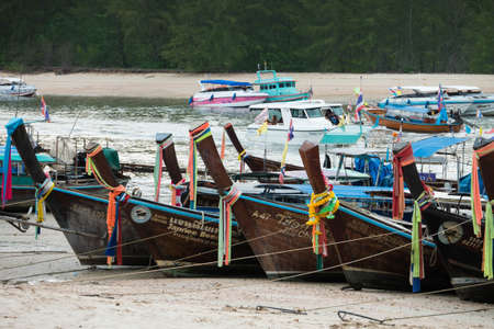 Krabi, Thailand - May 19, 2016 : Longtail boats in a canal at Nopparatthara pier, Ao Nang, Krabi, Thailandのeditorial素材