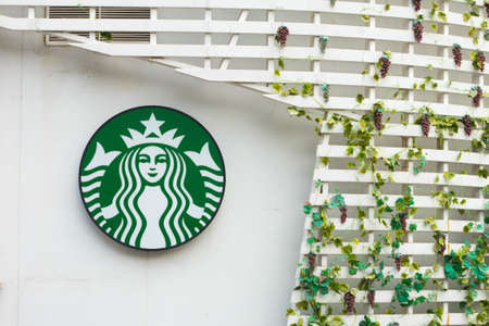 Bangkok, Thailand - April 17, 2016 : Exterior view of a Starbucks store Drive Thru and logo in Bangkok, Thailand. Starbucks is the world's largest coffee house with over 20,000 stores in 61 countries.のeditorial素材