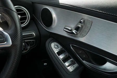 Door seat and mirror window adjust button switch control in luxury business carの写真素材
