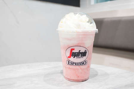 Bangkok, Thailand - June 26, 2017 : Segafredo Strawberry cream granita blended beverages, strawberry and cream frappe at Segafredo coffee shop in Bangkok.のeditorial素材