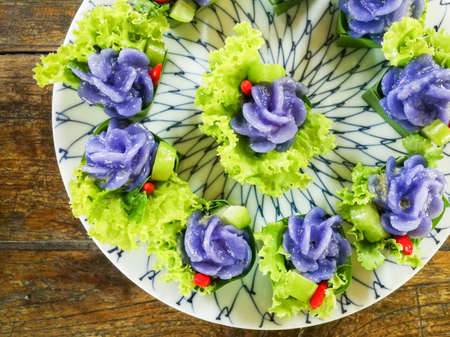 Chor Muang the flower shaped chicken Thai steamed purple dumplingの写真素材