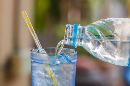 Water into glassの写真素材