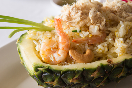 Fried rice in pineapple with shrimpの写真素材