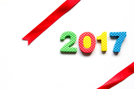Wording 2017 on white background with red ribbon