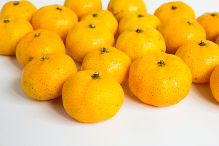 Group of mandarin orange (Citrus reticulata) on white backgroundの写真素材