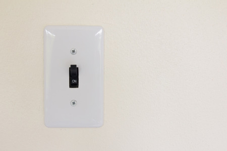 White switch st on state background (Concept for save energy or turn on idea)の写真素材