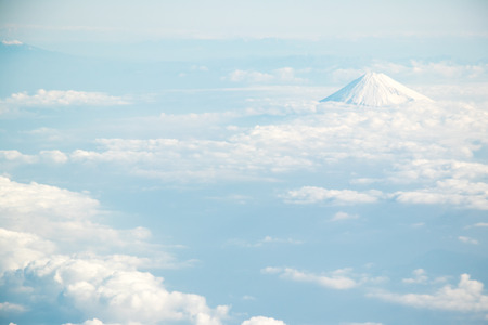 Fuji mountain in Japan with the group of cloud in the aerial view backgroundの写真素材