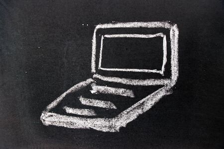 White chalk drawing as notebook shape on black board backgroundの写真素材