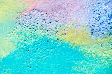Abstract pastel color painting on concrete block background (pink,blue,yellow,green)の写真素材