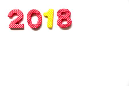 Toy foam alphabet in wording 2018 on white background (Concept for Happy new year decoration)
