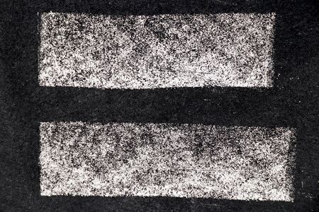 White chalk paint texture on black board background for decoration or grunge layer