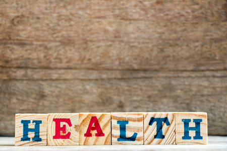 Block compose in word health on wood backgroundの写真素材