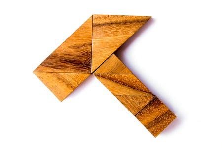 Wood tangram puzzle in hammer shape on white background