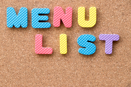 Color toy foam alphabet in word menu list on cork board background