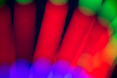 Abstract multi color of glow fluorescent on black background