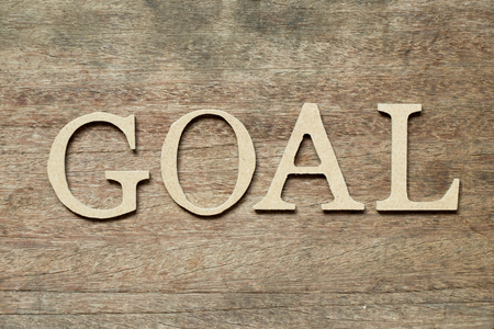 English alphabet in word goal on wood backgroundの写真素材
