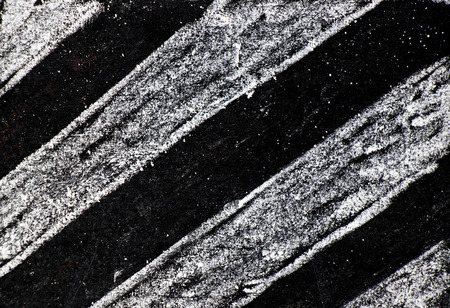 White chalk hand drawing in stripe shape on blackboard backgroundの写真素材