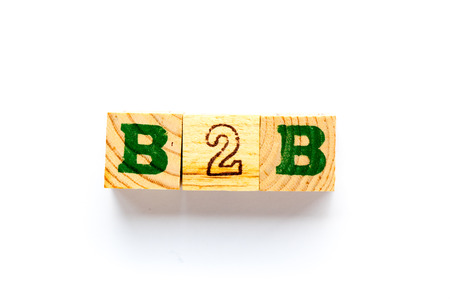 Wood block in word B2B (business to business) on white backgroundの写真素材