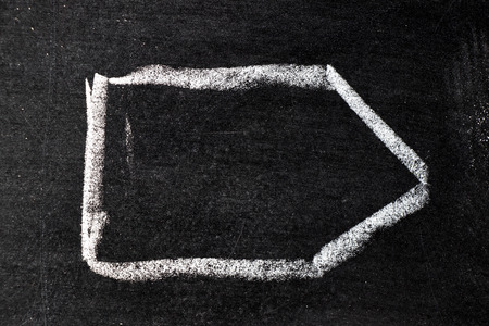 White chalk hand drawing in tag shape on blackboard backgroundの写真素材
