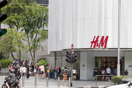 Singapore, May 7, 2017 : H&M store at orchard road with unidetified traveler