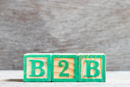 Color letter block in word b2b (abbreviation of business to business) on wood backgroundの写真素材