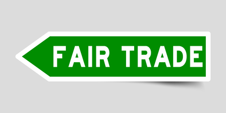 Arrow shape green color sticker in word fair trade on gray backgroundのイラスト素材