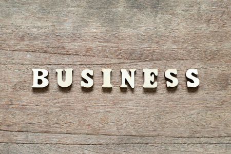 Letter block in word business on wood backgroundの写真素材