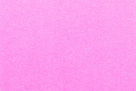 Abstract pink color paper textured background with copy space for design and decorationの写真素材