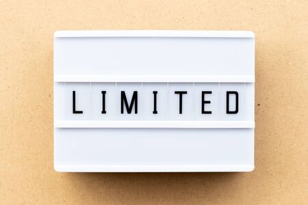 Light box with word limited on wood backgroundの写真素材