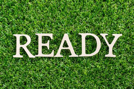Wood letter in word ready on artificial green grass backgroundの写真素材